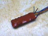 Green and violet wires cut short