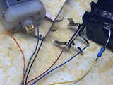 Motor, metal wipers, and resistor soldered in place