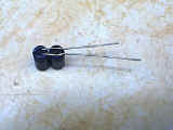 Two capacitors soldered together