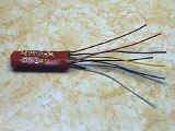 Blue, white, and yellow wires cut to length