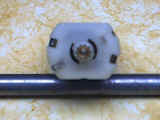 Motor with tab bent